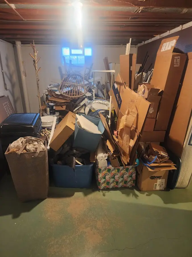 Roll-off dumpster container at job site for 6 Yard Dumpster Rental in Mullins